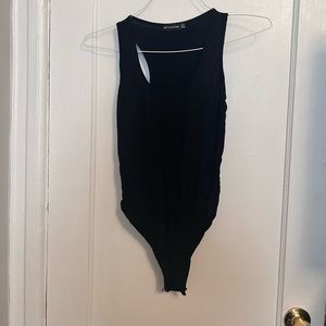 Black, sleeveless, scoop neck body suit. Size medium